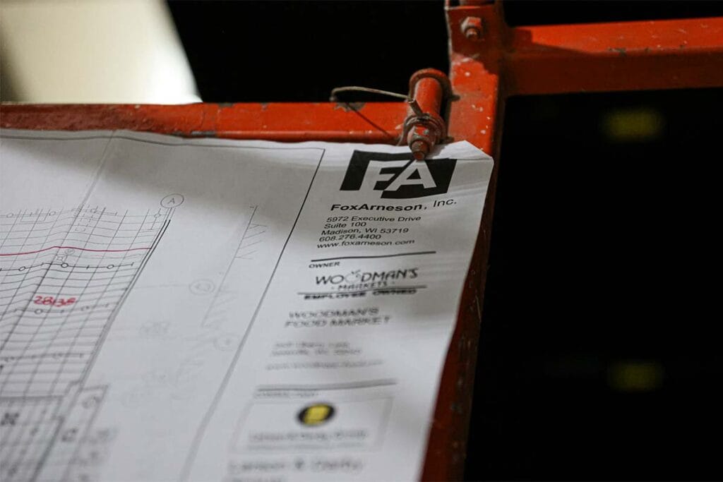 A building plan with Fox Arneson's logo on it